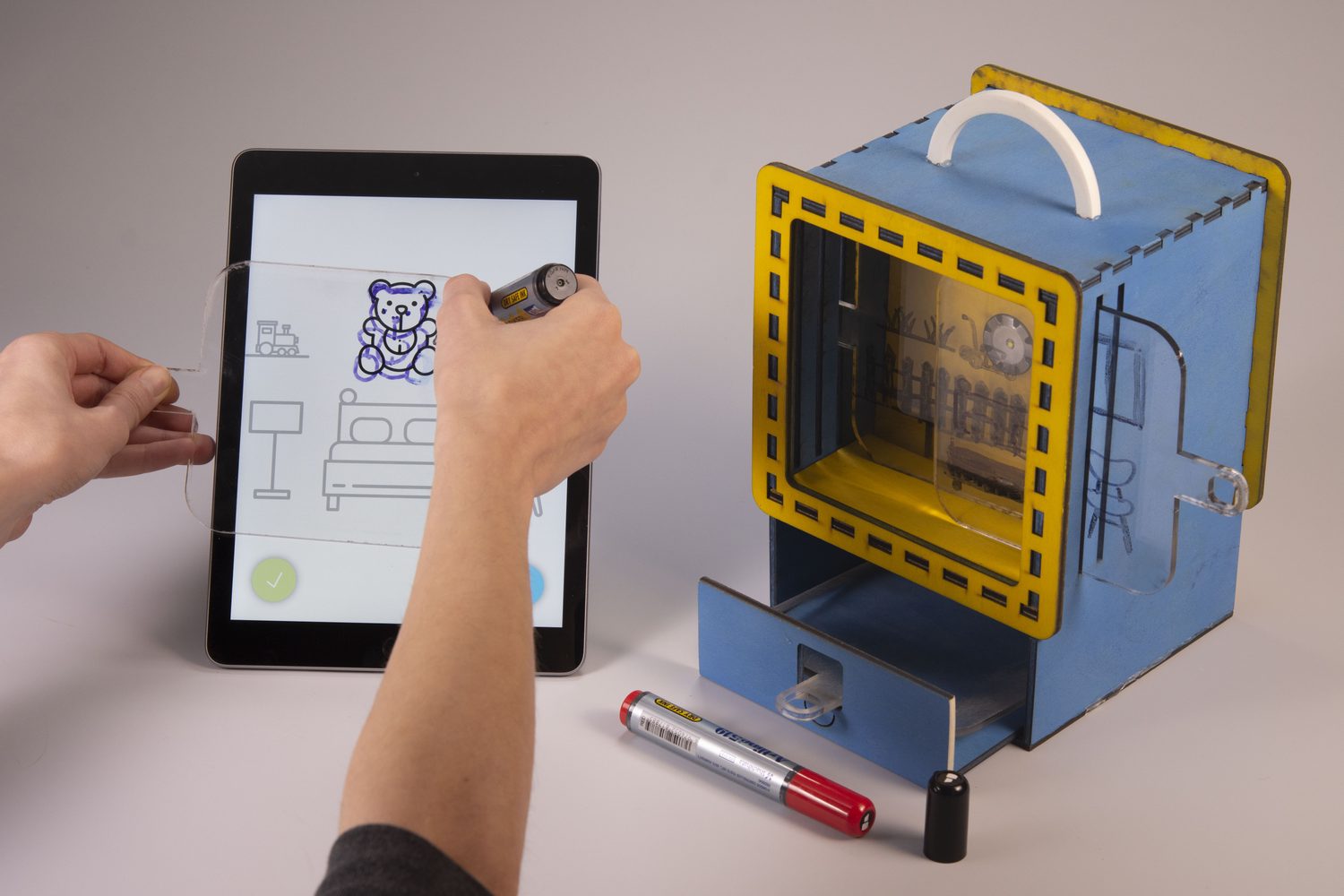 Selecting character and place on the tablet, then inserting the card