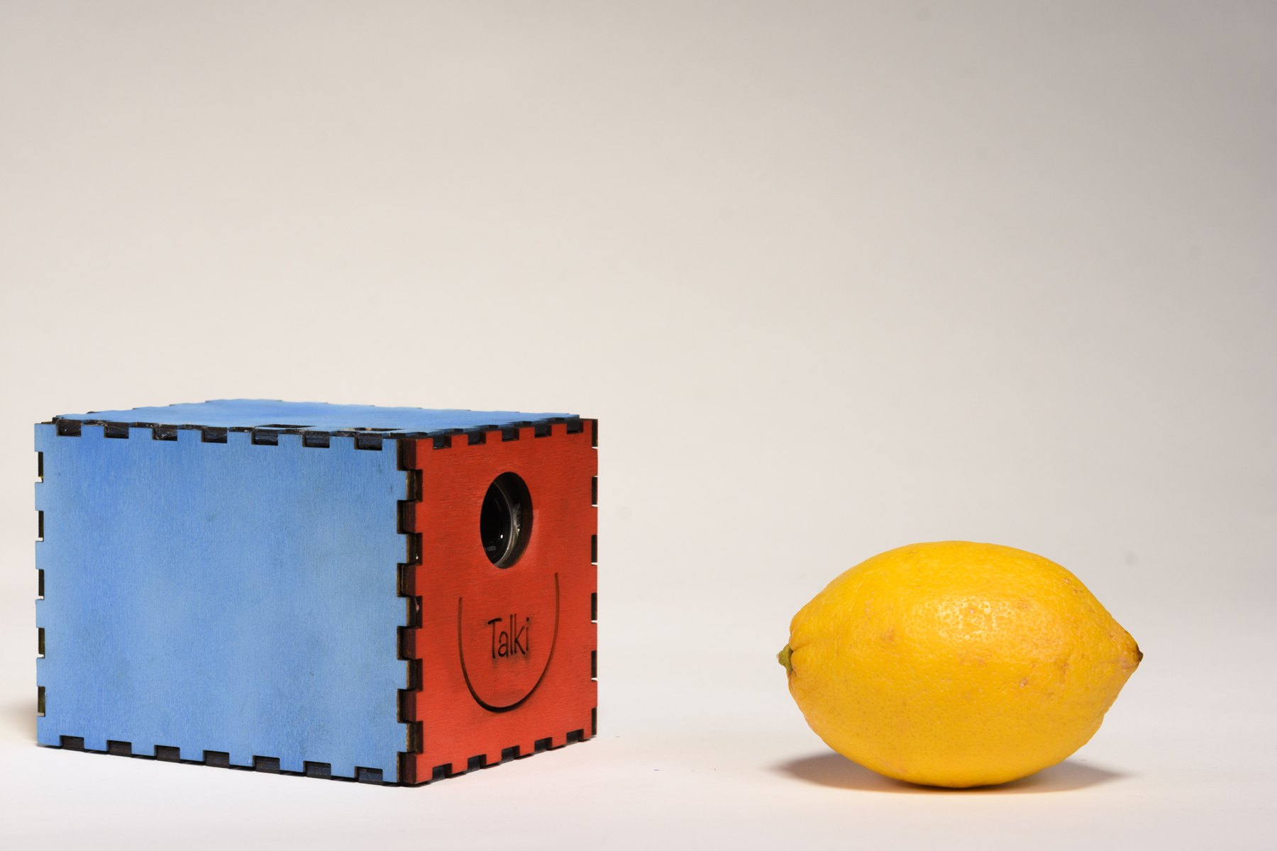 Talki next to a lemon, for scale